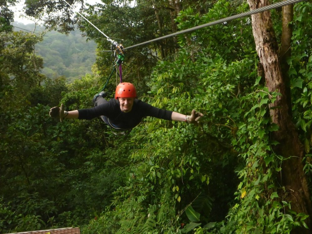 I'm arriving at the end of the longest Superman zip line cable in Latin America!